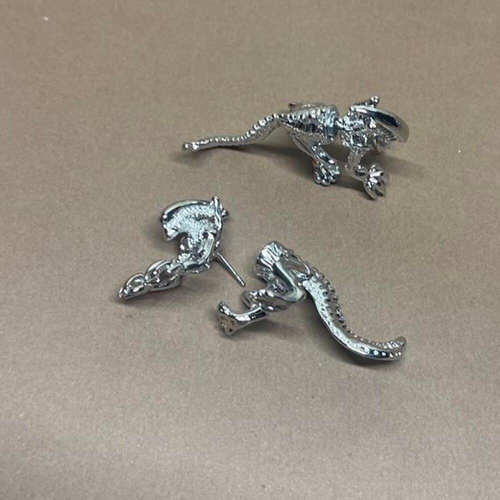 Silver alien earrings